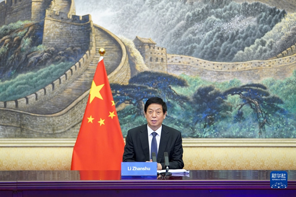 栗战书同哈萨克斯坦议会下院议长科沙诺夫举行会谈